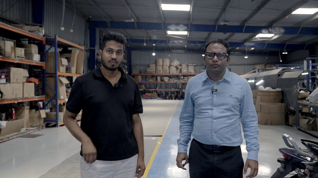 Ram Prayaga, walking the warehouse with a founder